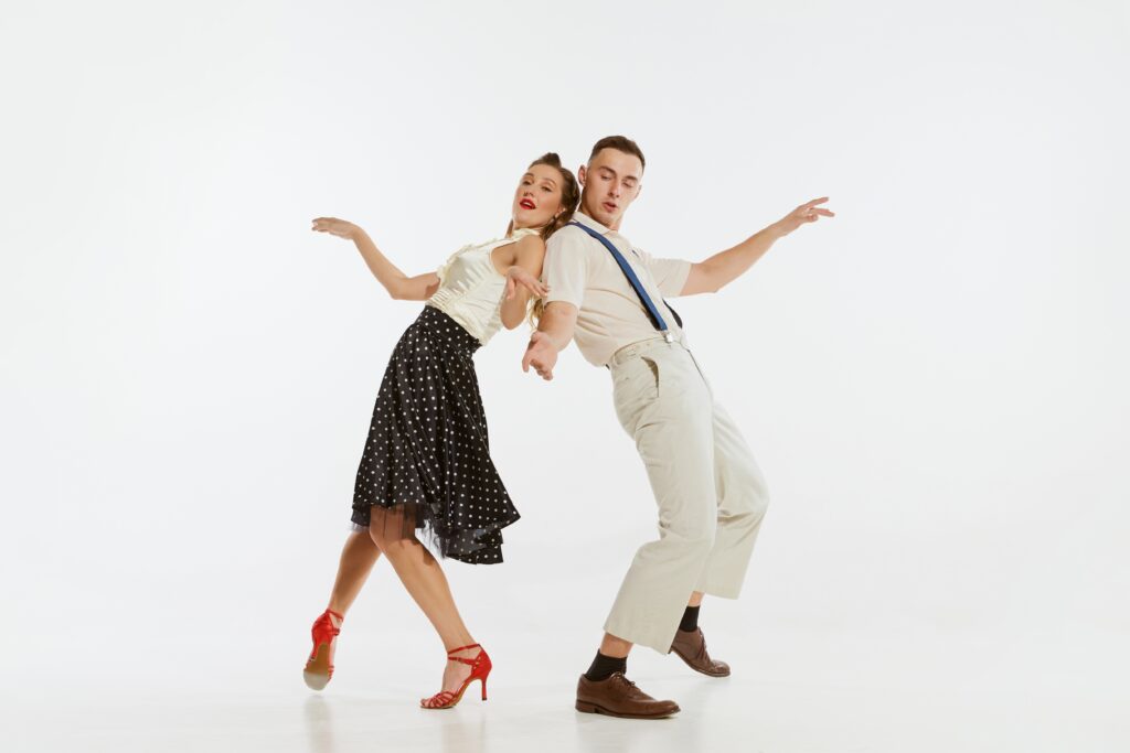Love,In,Motion.,Young,Excited,Man,And,Woman,Wearing,60s