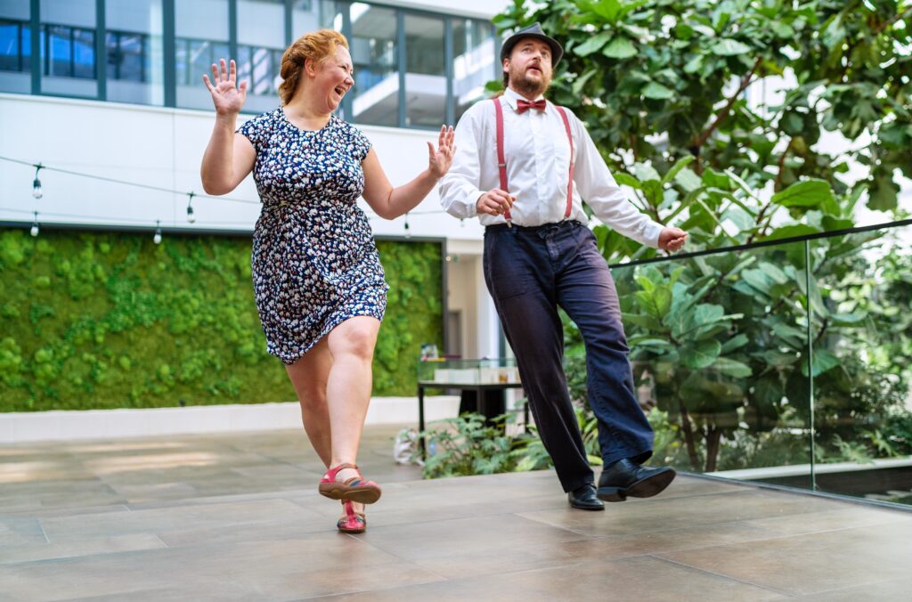 Cheerful,Couple,Dressed,In,Vintage,Clothes,Dancing,Retro,Swing,Dance