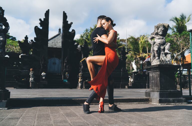 Beloved,Couple,Of,Dancers,Performing,Tango,On,Square