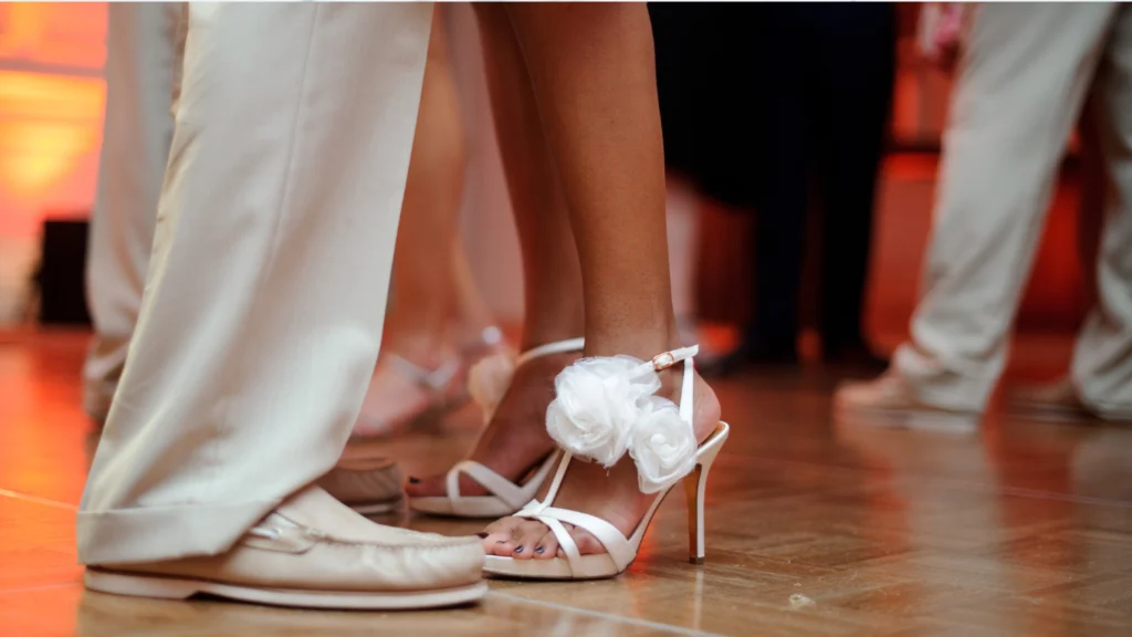 Close-up of couple’s feet dancing during a ballroom dance lesson in The Woodlands TX